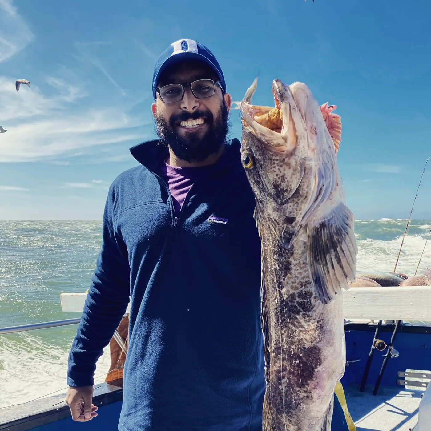 Nikhil with a lingcod